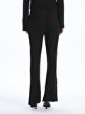 Beli Lastikli Parlak Görünümlü Kadın Triko Pantolon_W4KJ21Z8-CVL_8684680172985_2XL