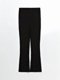 Beli Lastikli Parlak Görünümlü Kadın Triko Pantolon_W4KJ21Z8-CVL_8684680172985_2XL