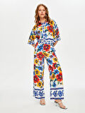 Resort Çiçek Desen Paçası Yırtmaçlı Wide Leg Fit Viskon Pantolon S25PNT045