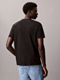 Calvin Klein SS 30s EU SP OUTLINE TAPE GRAPHI Erkek SİYAH T-shirt LV04RC852G-UB1