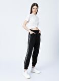 Tommy Jeans DW0DW12155BDS  Normal Bel Relaxed Siyah Kadın Pantolon