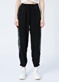 Tommy Jeans DW0DW12155BDS  Normal Bel Relaxed Siyah Kadın Pantolon