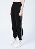 Tommy Jeans DW0DW12155BDS  Normal Bel Relaxed Siyah Kadın Pantolon