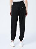 Tommy Jeans DW0DW12155BDS  Normal Bel Relaxed Siyah Kadın Pantolon