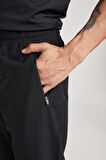 DeFactoFit Dokuma Esnek Multifonksiyonel Sporcu Jogger Eşofman Altı Slim Fit Dar Kesim Çift Cepli C1212AX24SPBK81