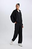 DeFactoFit Wide Leg Geniş Paça Cepli Sporcu Dokuma Pantolon C9414AX25SPBK81