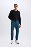 DeFactoFit Sporcu Jogger Eşofman Altı Standart Fit Üç Cepli Beli Bağcıklı Lastikli Paça D3741AX24WNBE821