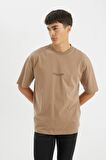 DeFacto Oversize Fit Bisiklet Yaka Sırt Baskılı Kısa Kollu Tişört D4910AX24AUBN551