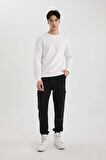 DeFacto Regular Fit Jogger Eşofman Altı Beli Bağcıklı Lastikli Paça Cepli C5384AX24SPBK81