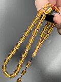 Ateş Kehribar Tesbih Sarı Kapsül Model 7x11mm 33 Tane Sistemli Tane Boşlukları Ayarlanabilir Püskül AK04075.180324