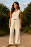 Kadın Beyaz Tek Omuzlu Şık Bluz & Geniş Paça Pantolon İkili Takım