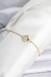 Pirinç Gold Renk Zirkon Taşlı Yonca Model Su Yolu Kadın Bileklik - EBJ260509W42106