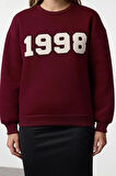 Kadın Relaxed Bisiklet Yaka Düşük Kol Uzun Kalın Polarlı Normal Kesim Slogan Nakışlı Örme Sweatshirt