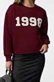 Kadın Relaxed Bisiklet Yaka Düşük Kol Uzun Kalın Polarlı Normal Kesim Slogan Nakışlı Örme Sweatshirt