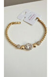 ÇELİK BİLEKLİK XUPİNG TAŞLI 14 AYAR GOLD RENGİNDE SAVOROSKİ TAŞLI 17+2 CM FMACCESORİES