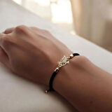 Hande'ye Özel 14 Ayar Altın Plakalı, Siyah Örgülü ve Kuş Figürlü Bileklik