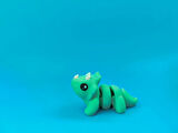 Sevimli Triceratops Dinazor Figürü – Hareketli Eklemli 3D Oyuncak