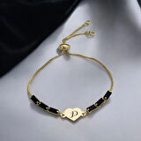 Göz Alıcı ve Şık Siyah Taşlı Kalp Figürlü 14 Ayar Altın Plakalı P Harfli Bileklik