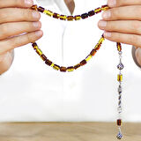 Kararmaz Metal Halat Püsküllü Kapsül Kesim Sarı - Siyah Fosilli Beyrut Kehribar Tesbih