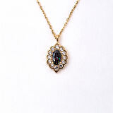 Oval Mistik Topaz Taşlı Yanları Zirkon Taşla Süslenmiş Modern Tasarım 925 Ayar Gümüş Kolye