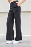 Kadın İpeksi Modal Esnek Kumaş Yüksek Bel Önden Dikişli Yan Cepli Bol Paça Palazzo Pantolon-Siyah