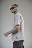 Önü Logolu Nakış Detaylı Reglan Kol Unisex Oversize Kalıp Tişört