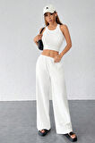Kadın Beyaz Bol Kesim Cepli Geniş Paça Dökümlü Pantolon