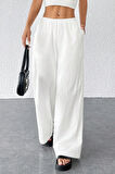 Kadın Beyaz Bol Kesim Cepli Geniş Paça Dökümlü Pantolon