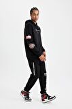DeFactoFit Kalın Jogger Eşofman Altı NBA Houston Rockets Standart Fit Normal Kesim Cepli Düz Paça C9278AX24AUBK81
