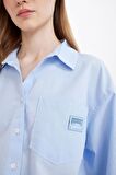 DeFacto Coool Oversize Geniş Kalıp Basic Düz Cepli Oxford Uzun Kollu Crop Gömlek D4031AX24AUBE551