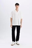 DeFacto Relax Fit Yazlık Polo Yaka Krinkıl Kumaş Kısa Kollu Beyaz Gömlek C7398AX24SMWT55