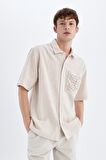 DeFacto Relax Fit Yazlık Polo Yaka Pamuklu Kısa Kollu Cepli Gömlek C7556AX24SMBG750