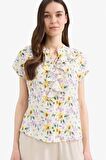 DeFacto Regular Fit Kaçık Yaka Çiçek Desenli Kısa Kollu Bluz F0995AX25SMYL273
