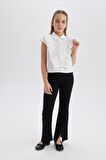 DeFacto Kız Çocuk Flare Fit Yırtmaçlı Pantolon B6893A825SMBK81