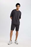 DeFactoFit Slim Fit Dar Kesim Cepli Baskılı Sporcu Şort A1625AX24SMAR214