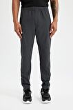 DeFactoFit Sporcu Dokuma Pantolon Slim Fit Dar Kesim Çift Cepli Fermuarlı Paça C9262AX24AUAR231