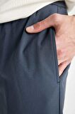 DeFacto Yazlık Kumaş Jogger Pantolon Beli Bağcıklı Lastikli Düz Paça Cepli Her Yöne Esneyen A9943AX24AUNV125