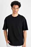 DeFacto %100 Pamuk Relax Fit Bisiklet Yaka Kısa Kollu Basic Düz Siyah Tişört D3673AX24AUBK81