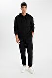 DeFacto Siyah Comfort Regular Fit Rahat Kalıp Kapüşonlu Kalın İçi Yumuşak Tüylü Fermuarlı Sweatshirt D2323AX24AUBK81
