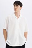 DeFacto Relax Fit Yazlık Polo Yaka Krinkıl Kumaş Kısa Kollu Beyaz Gömlek C7398AX24SMWT55