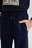 DeFacto Erkek Çocuk Lacivert Beli Paçası Lastikli Baskılı Jogger Eşofman Altı D4476A824WNNV245
