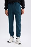 DeFactoFit Sporcu Jogger Eşofman Altı Standart Fit Üç Cepli Beli Bağcıklı Lastikli Paça D3741AX24WNBE821