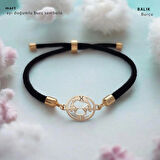 Baharın Taze Havasını Taşıyan 14 Ayar Altın Plakalı Siyah Örgülü Mart Bilekliği