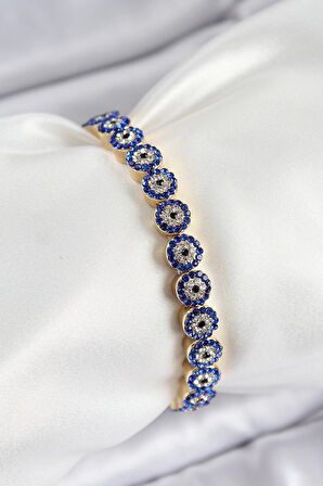 Pirinç Zirkon Taşlı Lacivert Nazar Model Gold Renk Lastikli Kadın Bileklik