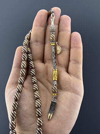 GÜMÜŞ İŞLEMELİ VE PÜSKÜLLÜ MERT AKTAŞ KUKA KAPSÜL KESİM 8X11,50