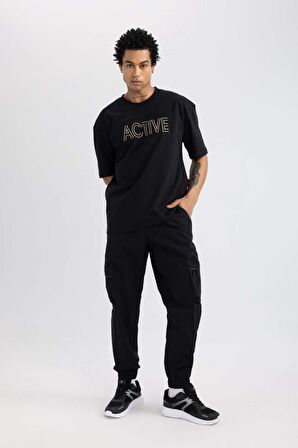 DeFactoFit Oversize Geniş Kalıp Kargo Cepli Sporcu Dokuma Pantolon C1528AX24SMBK81