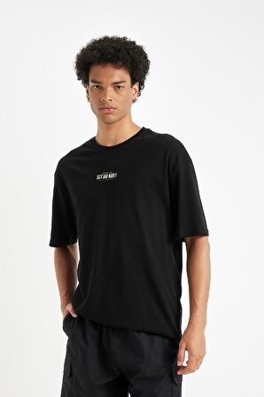 DeFacto Rick and Morty Boxy Fit Bisiklet Yaka Pamuklu Sırt Baskılı Kısa Kollu Tişört C6511AX24AUBK81