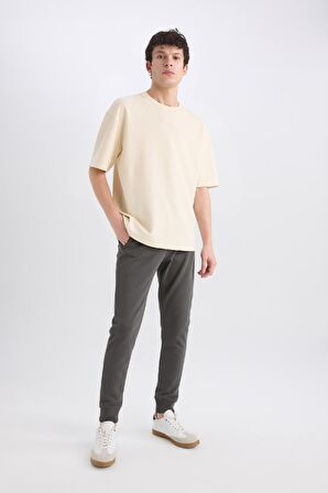 DeFacto Jogger Eşofman Altı Slim Fit Dar Kesim Beli Bağcıklı Lastikli Paça Fermuar Cepli A4387AX24AUAR227