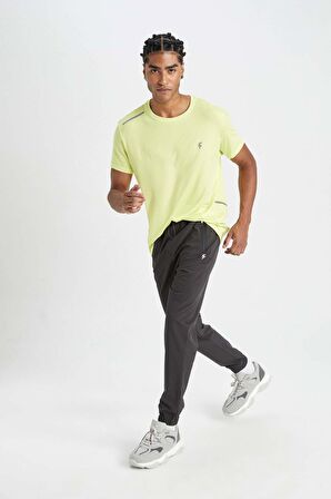 DeFactoFit Sporcu Jogger Eşofman Altı Standart Fit Çift Cepli Dokuma Beli Paçası Lastikli B5147AX24SPAR231
