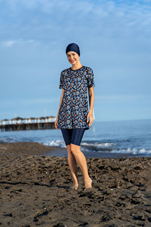 MİRATES LACİVERT  ÇİÇEK DESENLİ YARIM KOL BÜYÜK BEDEN MİCRO (ESNEK VE ÇABUK KURUYAN) KUMAŞ YARI TESETTÜR MAYO